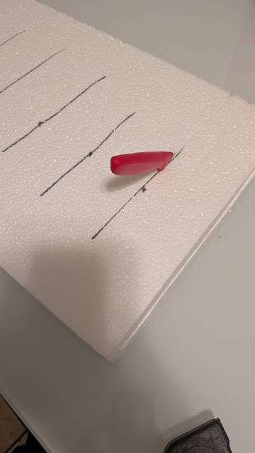 Arts-and-crafts model: beams (kora’os) on a styrofoam board
