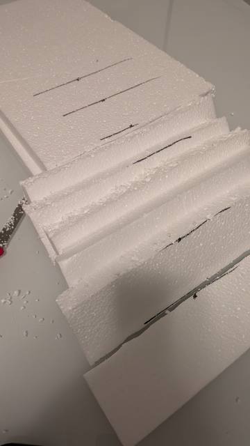 Arts-and-crafts model: beams at different heights