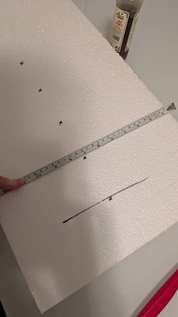 Arts-and-crafts model: measuring between the beams